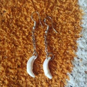 ethically sourced coyote fang dangle earrings - sterling silver & surgical steel